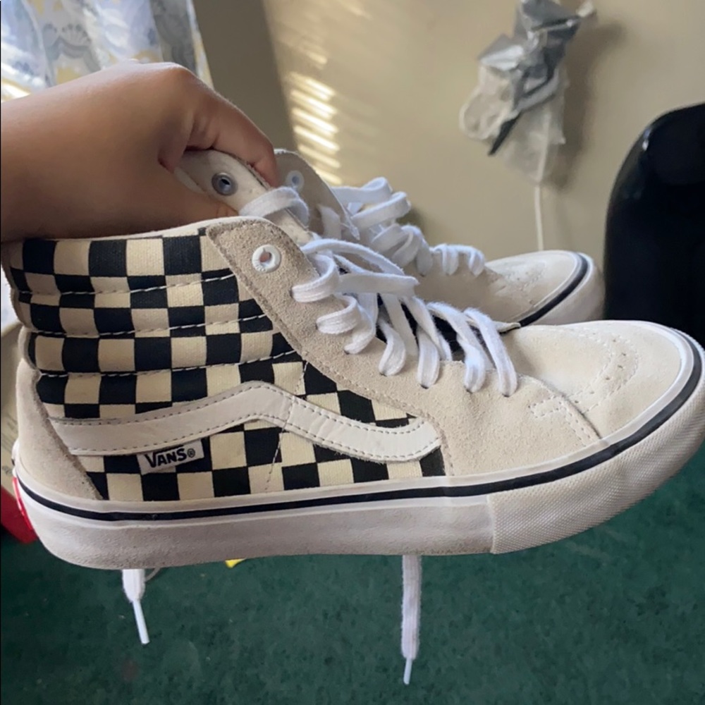 White high top checkered vans